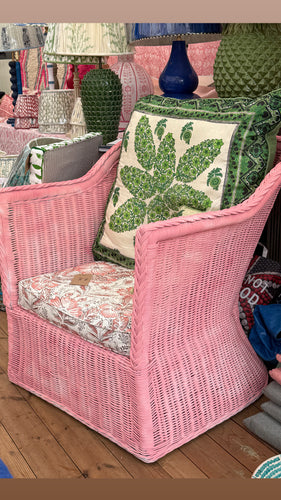 Shrimp wicker chair with flower cushion