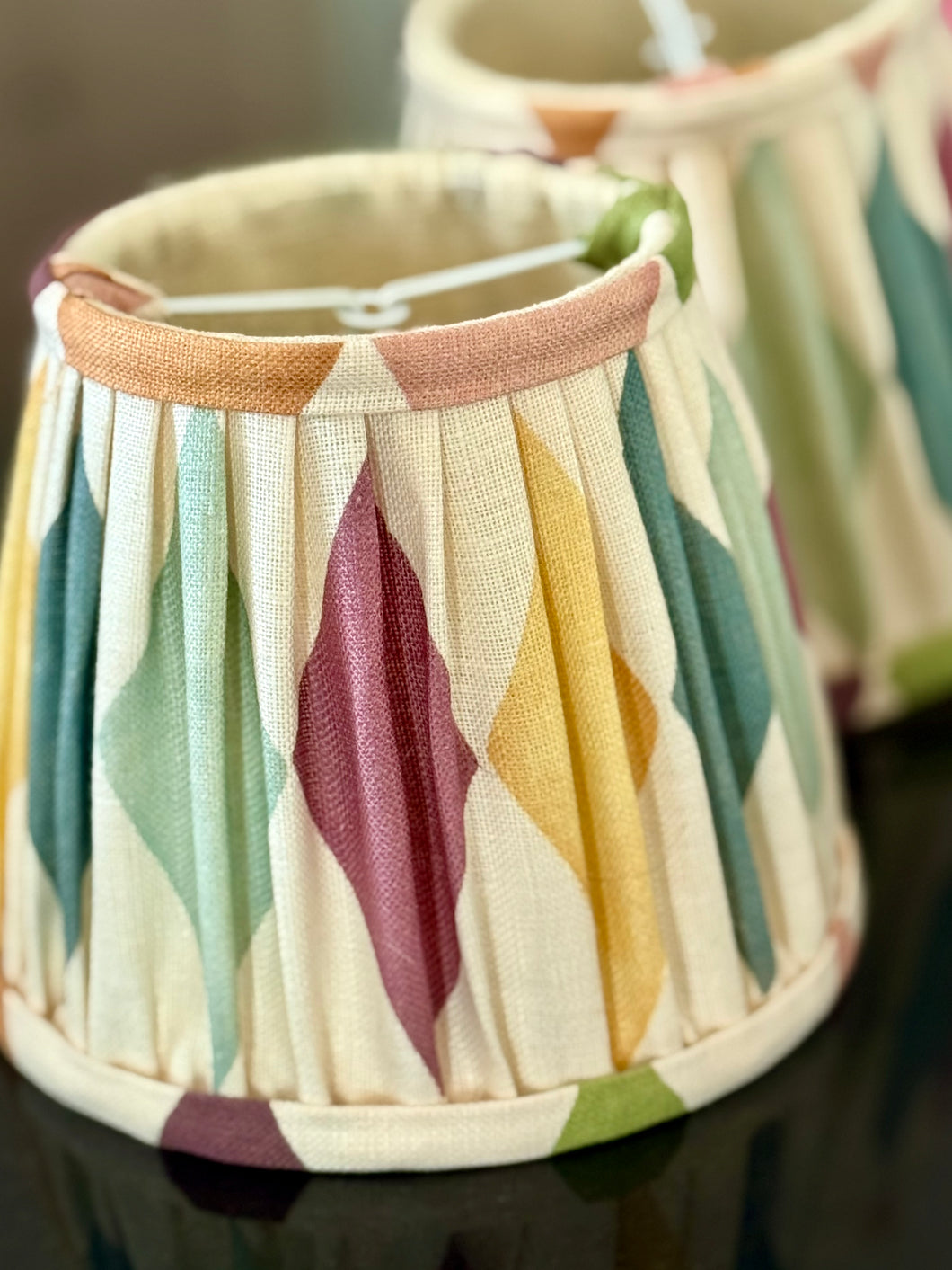 A pair of harlequin linen candle clip lampshades 6”