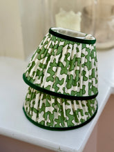 Load image into Gallery viewer, A pair of green squiggle 7” candle clip shades